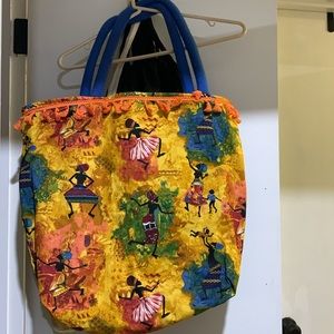 Hand made outeast reversible tote bag .